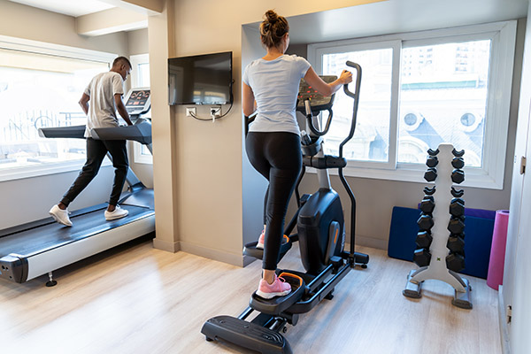 Guests using hotel gym