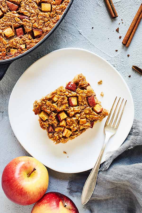 Old-fashioned rolled oats, ground cinnamon, and unsweetened applesauce make this Baked Apple Cinnamon Oatmeal a healthy breakfast treat.