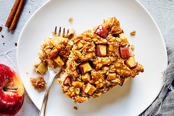 Old-fashioned rolled oats, ground cinnamon, and unsweetened applesauce make this Baked Apple Cinnamon Oatmeal a healthy breakfast treat.
