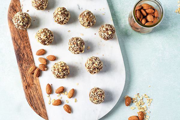 Vanilla Almond Energy Balls on marble cutting board