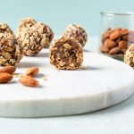 Vanilla Almond Energy Balls on marble cutting board