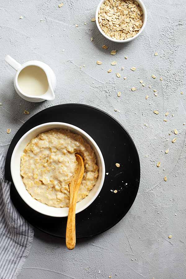 This Almond Milk Oatmeal gets is rich and creamy with old fashioned rolled oats and a touch a sea salt to give it a classic flavor.