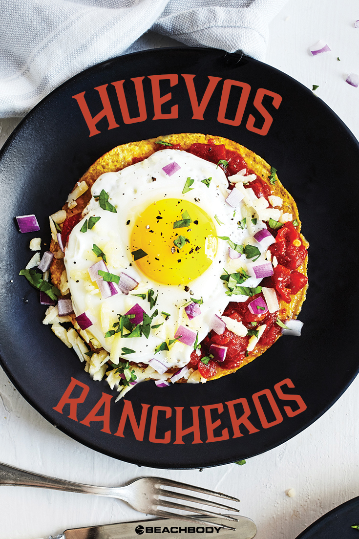 These healthier Huevos Rancheros nix the deep fried chips in favor of a single baked tortilla topped with a rich red chili sauce and a single sunny egg.