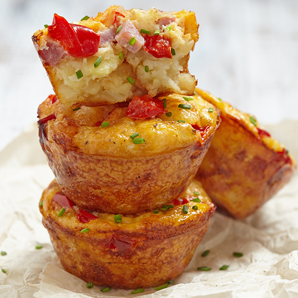 Mini Denver Quiches stacked on plate