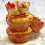 Mini Denver Quiches stacked on plate