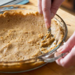 This butter-free Whole Wheat Graham Cracker Pie Crust uses healthier ingredients like all natural maple syrup and whole wheat gram crackers.