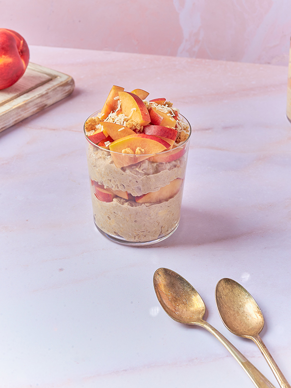 Vanilla Peach Overnight Oats in a glass