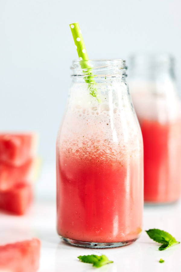 This Minty Watermelon Shakeology smoothie featuring freshly chopped mint and juicy watermelon makes a refreshing afternoon snack.