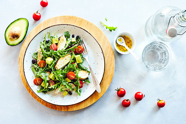 This hearty arugula salad with chicken has only 5 ingredients and can be made in minutes. Black beans, and avocado make it a satisfying lunch or dinner.