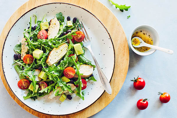 This hearty arugula salad with chicken has only 5 ingredients and can be made in minutes. Black beans, and avocado make it a satisfying lunch or dinner.