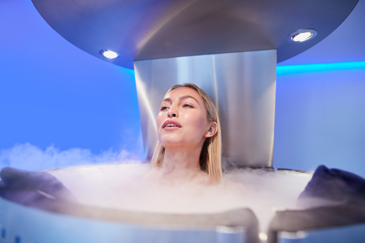 woman receiving whole body cryotherapy | Cryotherapy