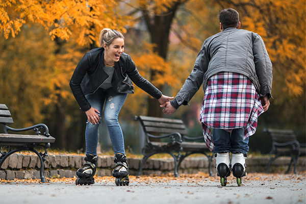 couple roller blading | date ideas