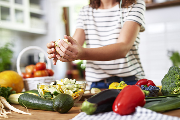 Woman chopping vegetables