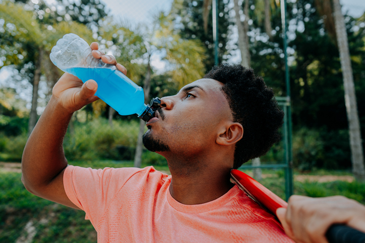 Man Drinks Sports Drink Between Sports | Foods That Seem Healthy But Arent