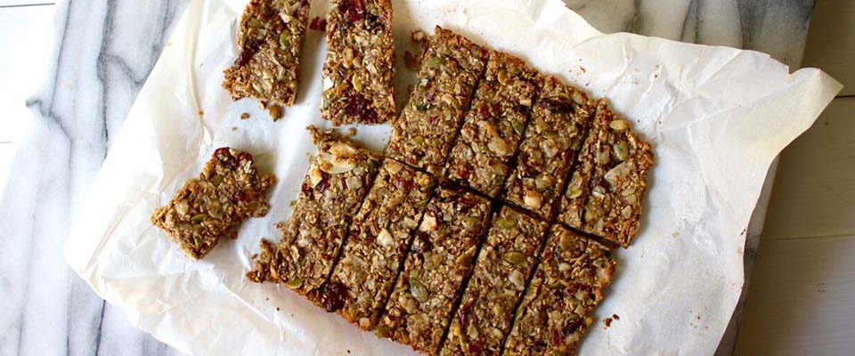 Crunchy seeds, chewy honey and sunflower seed butter, savory nuts, and sweet cranberries make these energy bars are the whole package.