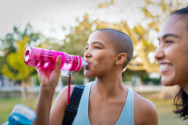 woman drinking water | Rest Day