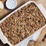 This authentic savory apple crisp dessert features the rich flavor of baked apples, walnuts, oats, and a touch of maple syrup.