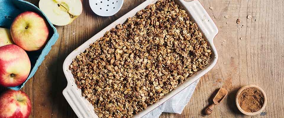 This authentic savory apple crisp dessert features the rich flavor of baked apples, walnuts, oats, and a touch of maple syrup.