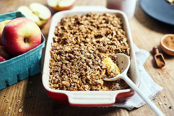 This authentic savory apple crisp dessert features the rich flavor of baked apples, walnuts, oats, and a touch of maple syrup.