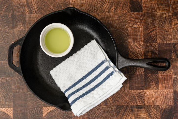 Cast-Iron Skillet with Towel and Oil | Cast-Iron Skillet