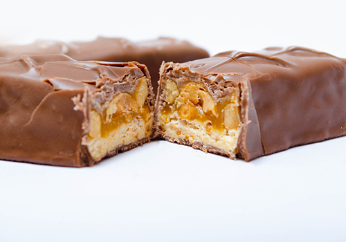 Isolated Bar of Snickers Split in the Middle