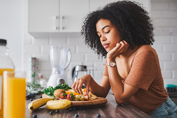 woman eating fruit