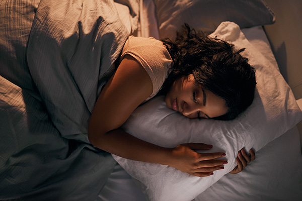 Woman asleep in bed