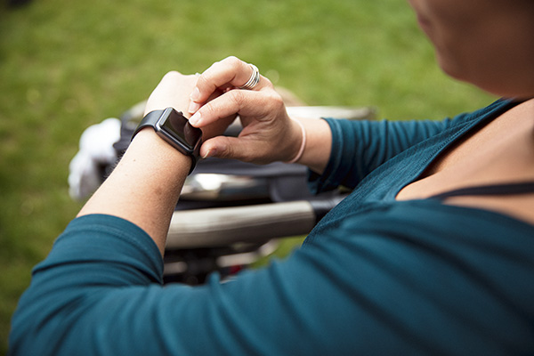 Woman checking her fitness tracker