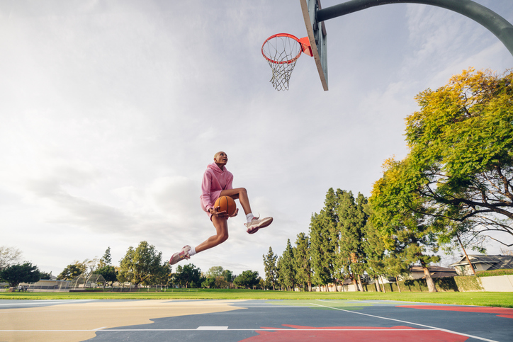 woman playing basketball | Plyometrics