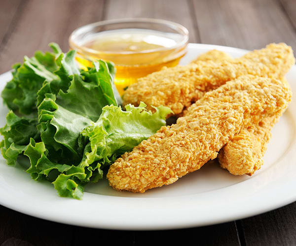 Almond crusted chicken fingers with honey mustard dipping sauce