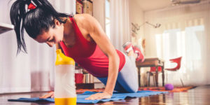 Beachbody On Demand woman working out at home