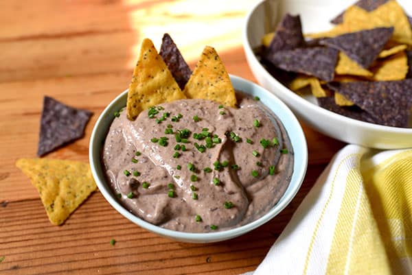 This creamy, spreadable Black Bean Hummus is made with tangy tahini, savory black beans, fresh lemon juice, and a touch of cayenne pepper.