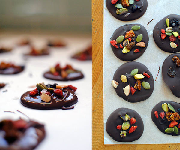 These chocolate superfood bites are devilishly simple to make and just look so impressive made with dried cranberries, pistachio pieces, and pumpkin seeds.