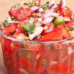 This simple yet robust Chunky Salsa features freshly diced tomatoes, green bell pepper, fragrant oregano, and fresh cilantro.