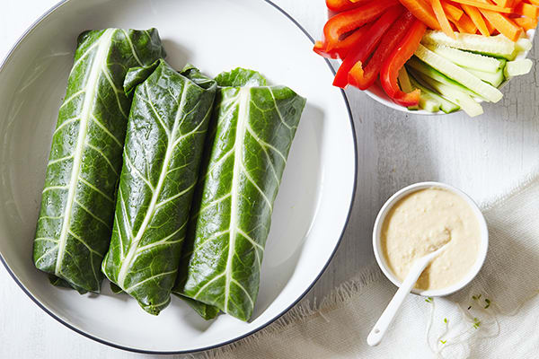 These veggie wraps made with collard greens and loaded with goodness are an easy dinner when it's too hot to cook, and they're a perfect brown bag lunch.