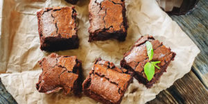 fudgy brownies on parchment paper