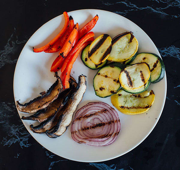 This healthier Grilled Veggie Quesadilla with Basil Pesto features Portobello mushroom, summer squash, zucchini, red bell pepper and whole wheat tortillas. 