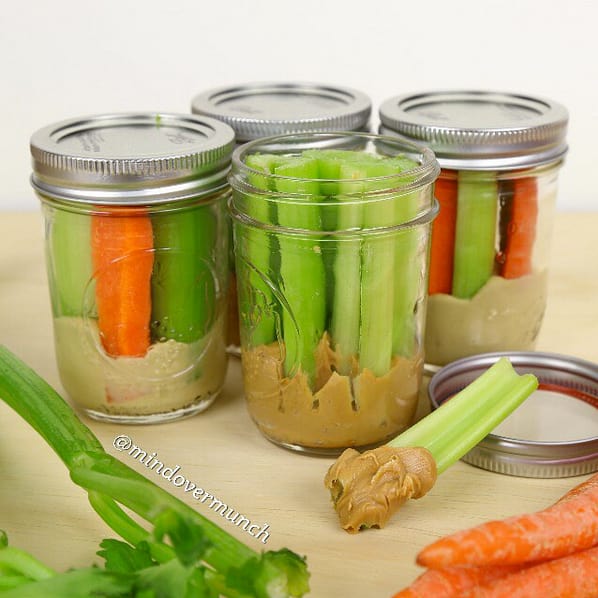 Meal prep snacks mason jars with peanut butter and celery sticks