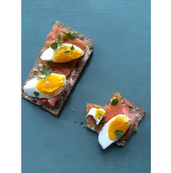 Meal prep snacks wasa crackers with salmon lox and hard-boiled eggs