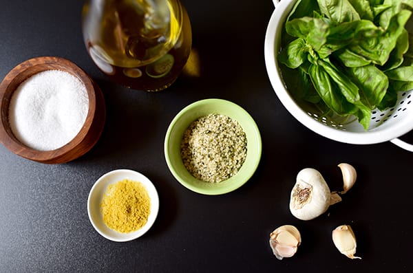 This Quinoa with Sun-Dried Tomatoes and Pesto recipe is a bowl of superfood that tastes incredible made with hemp seeds, fresh baby spinach, and basil.