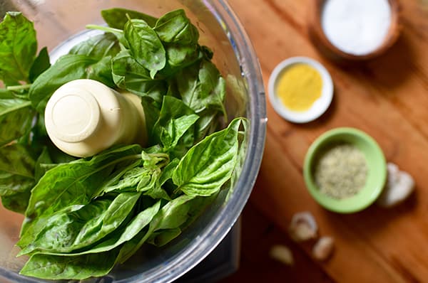 This Quinoa with Sun-Dried Tomatoes and Pesto recipe is a bowl of superfood that tastes incredible made with hemp seeds, fresh baby spinach, and basil.