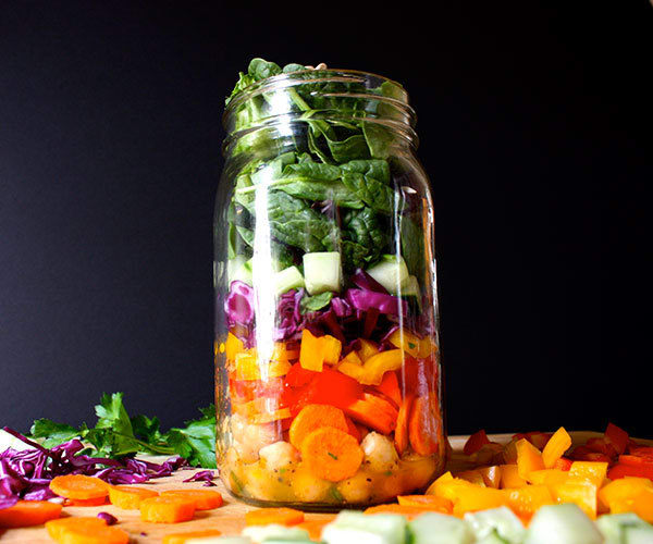 Rainbow salad in a glass jars Stock Photo by ©sarsmis 73088347