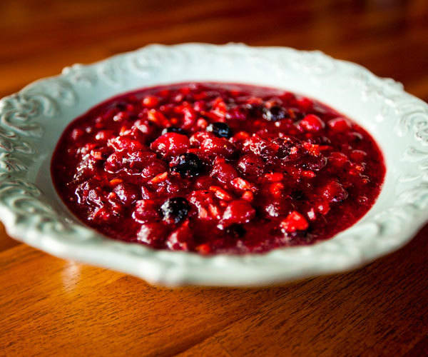 Healthy cranberry sauce recipe sweetened with fruit juice and maple syrup.