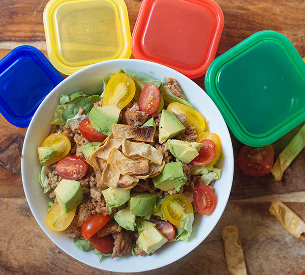 With seasoned ground turkey, this Healthier Taco Salad Recipe is loaded with crisp lettuce, juicy tomatoes, diced avocado, and crunchy tortilla strips.