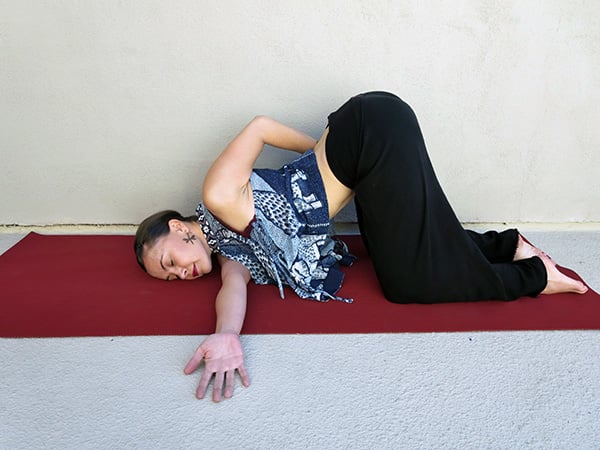 Thread the needle pose shoulder pain yoga