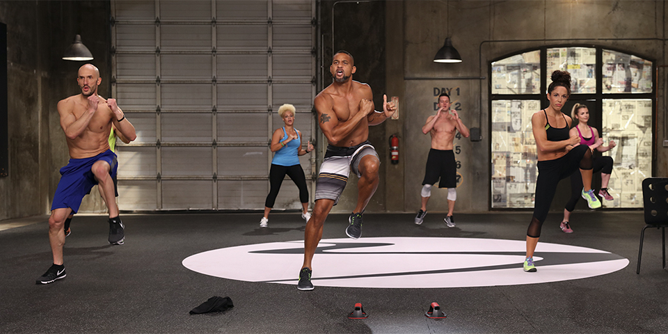 Shaun T leading a home workout