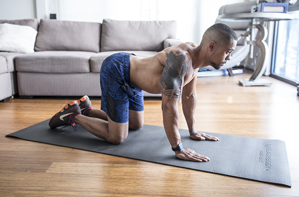 3 of the Best Trap Exercises for Muscle and Power cat stretch