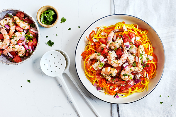This quick shrimp recipe with fresh tomato salsa is served over spiralized carrot and squash noodles. It’s easy to make and high in protein!