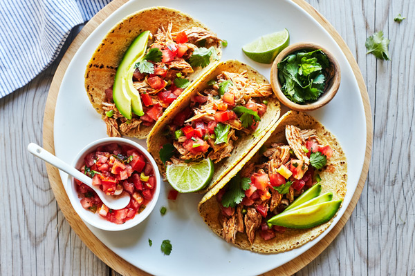 https://bod-blog-assets.prod.cd.beachbodyondemand.com/bod-blog/wp-content/uploads/2017/09/Slow-Cooker-Chicken-Tacos-2.jpg