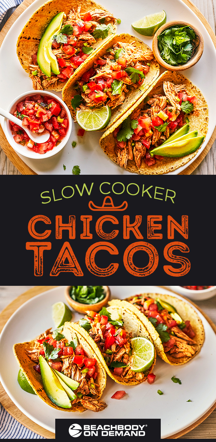 Bring the flavor of your favorite Mexican restaurant home with this healthy recipe for Slow Cooker Chicken Tacos with fresh tomatoes, lime, cilantro and avocado.